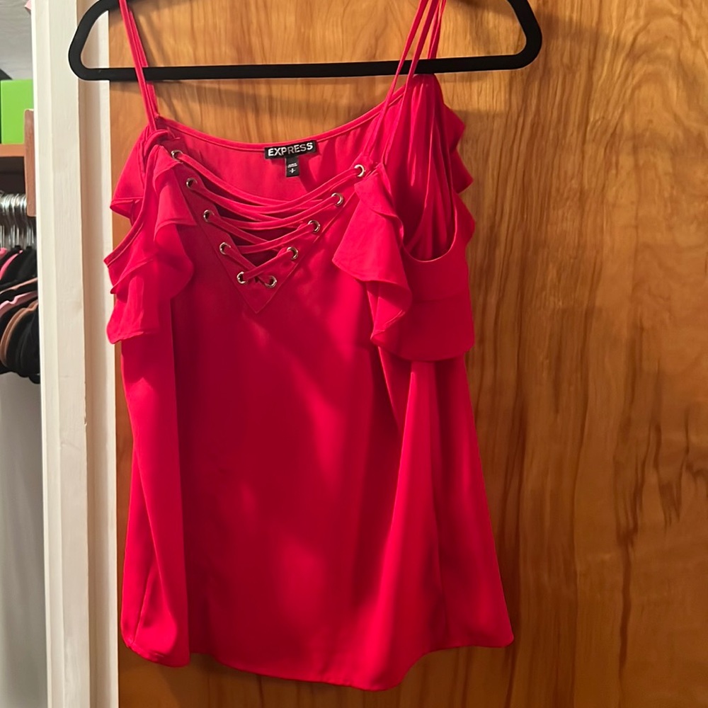 Red express tank with cross cross front and ruffle shoulder sleeve